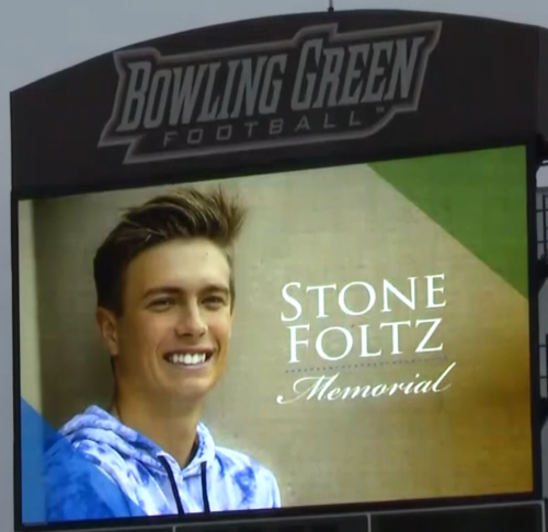 A picture of Bowling Green student Stone Foltz is shown on the university's football stadium during a memorial following his death from a hazing incident in 2021.