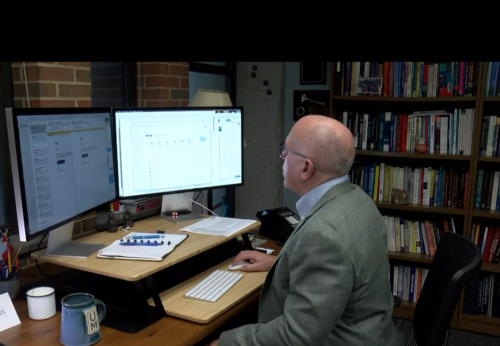 James Whelan, director of the Institute for Gambling Education and Research, works at his desk at the University of Memphis.