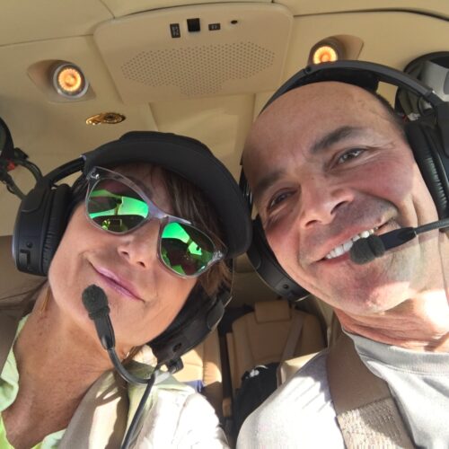 Ellen Sturm with her late partner, Steve Barnes. Sturm said they loved adventure and frequently flew together in the plane that was housed near the home the couple shared in Buffalo, New York. Credit: Courtesy of Ellen Sturm