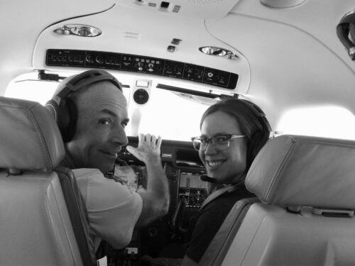 Steve Barnes pictured with his niece, Elizabeth, on a flight together in the months before an October 2020 crash that took both of their lives. Credit: Courtesy of Ellen Sturm
