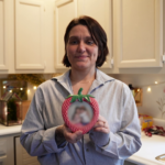 Alisha Ladyga holds a photo of her girls. “I don't regret that I was sent to prison because it saved me. It saved my kids," she said.