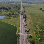 An aerial photo shows the aftermath of an August 2025 hazmat derailment involving more than 20 cars carrying crude oil near Reeseville, Wisconsin.(Dodge County Sheriff's Office)