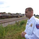 CLR Fire & Rescue Chief Eric Howlett looks out at the tracks near Reeseville, Wisconsin that have seen two derailments in just over two years.(Scotty Smith, InvestigateTV)