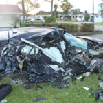 The passenger side of Bishop's car after it was hit by the small aircraft. NTSB Photo