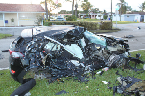 The passenger side of Bishop's car after it was hit by the small aircraft. NTSB Photo